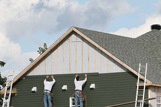 Professional Siding Replacement technician working in Melrose, MA